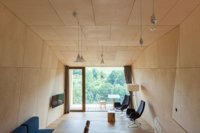 We transformed a former mountain school into modern apartments with a wellness zone