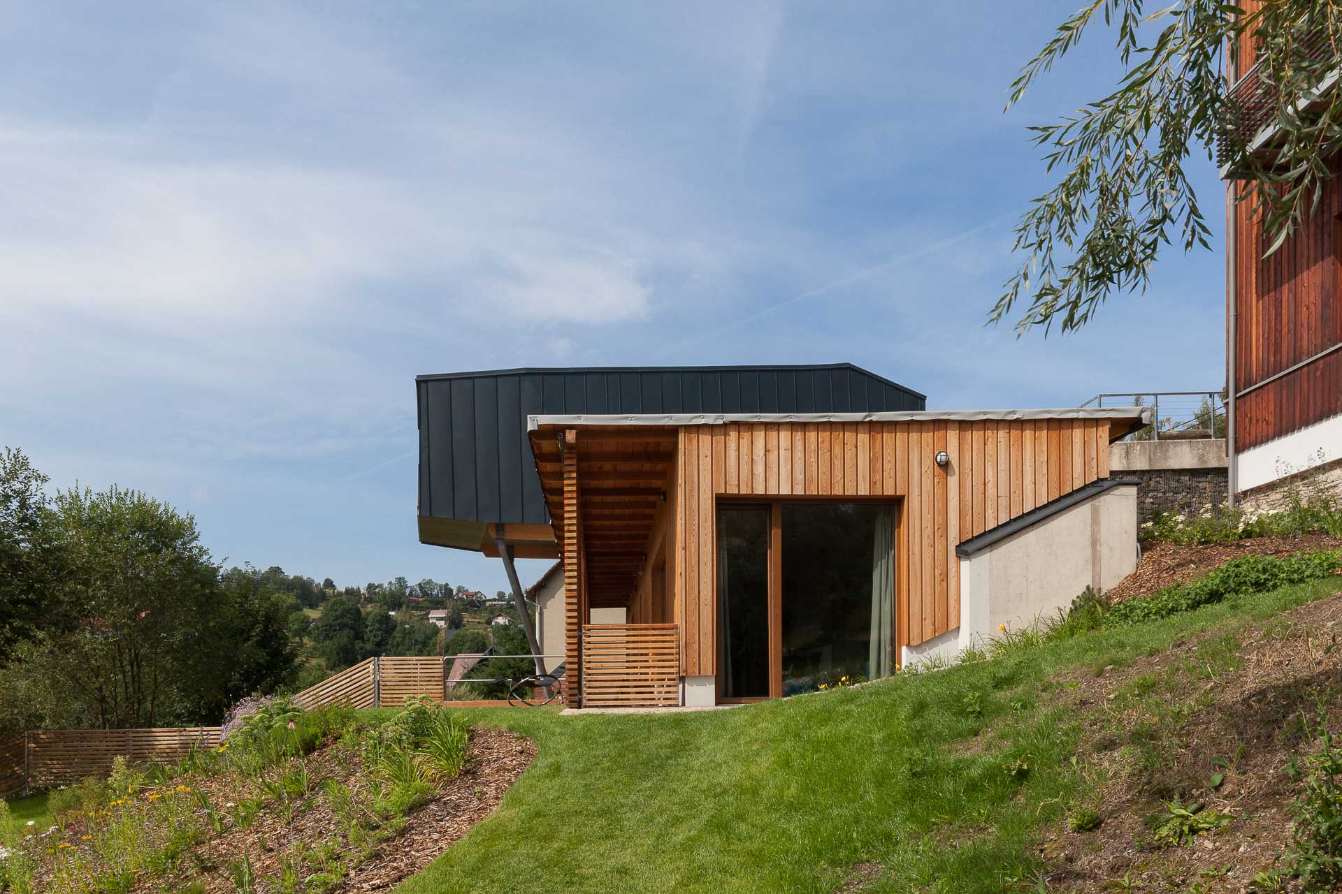 We transformed a former mountain school into modern apartments with a wellness zone